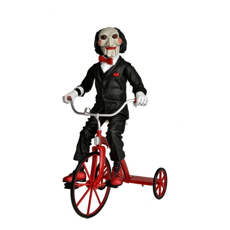 Figura articulada de Billy con Triciclo (con sonido - 30 cm) en Saw por NECA